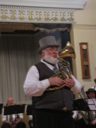 Herb Poole, artistic director of the band; “I love to play an instrument I can wear,” says Herb.