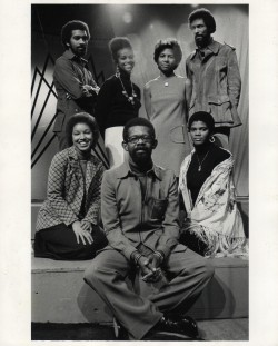 Ellis Haizlip, producer and host of the PBS series SOUL!, surrounded by his team. Clockwise left to right: Sherry Santifer, Stan Lathan, Loretta Greene, Leslie Demus, Alonzo Brown and Anna Maria Horsford. Photo credit: Bill Whiting.