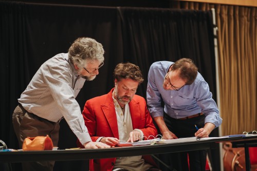 (from left) Assistant conductor Derek Bate, composer Rufus Wainwright, and COC Music Director Johannes Debus at the first read-through of Hadrian’s score, May 2018. Courtesy COC