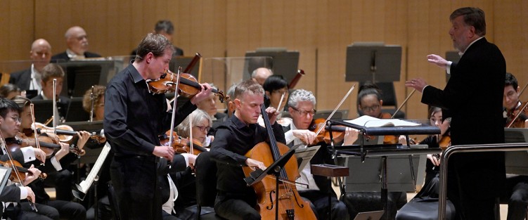 Jonathan Crow (violin) and Joseph Johnson (cello) with Sir Andrew Davis and the TSO. Photo credit: Jag Gundu.