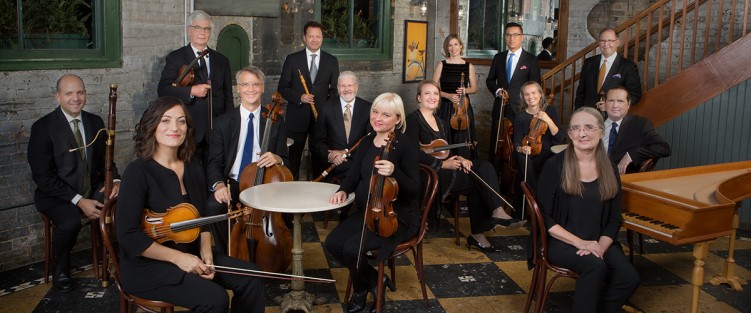 From left to right: Dominic Teresi, bassoon (seated); Elisa Citterio, violin (seated); Thomas Georgi, violin (standing, dark tie); Allen Whear, cello (seated); Marco Cera, oboe (standing); John Abberger, oboe (seated); Julia Wedman, violin (seated); Patricia Ahearn, violin (seated); Cristina Zacharias, violin (standing); Brandon Chui, viola (standing, blue tie); Geneviève Gilardeau, violin (seated); Patrick Jordan, viola (standing, yellow tie); Chris Verrette, violin (seated); Charlotte Nediger, harpsichord (seated). Photo by Cylla von Tiedemann