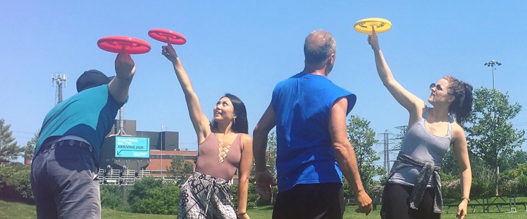 The cast of What Goes Up learning frisbee. Photo credit: Dahlia Katz
