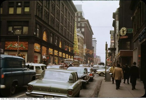 Simpsons, at left on Yonge Street, decorated for the Christmas holidays, December 1962. Photo by Ellis Wiley