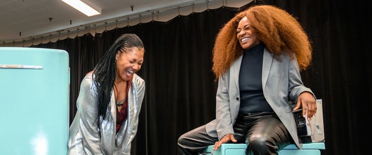 Sharing a laugh in the rehearsal hall – internationally renowned Canadian soprano Measha Brueggergosman (left) plays the virtuoso role of the Moon, a gorgeous maternal presence overseeing all, shining her light where the characters need to see, particularly Caroline, played by Jully Black (right). Photo by Dahlia Katz