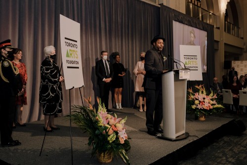 On stage: Celebration of Life Award-winner Dwayne Morgan. To his immediate right, Elizabeth Dowdeswell, Lieutenant Governor of Ontario.