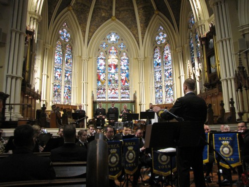 The combined bands of the naval reserve divisions of HMCS York (Toronto) and HMCS Star (Hamilton) in the Cathedral Church of St. James, Toronto. Photo Jack MacQuarrie