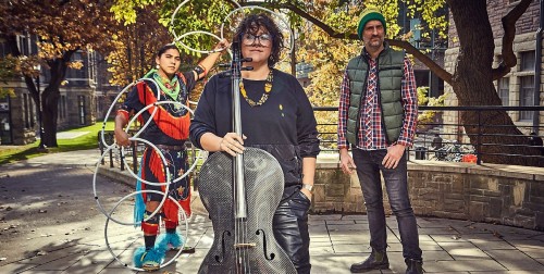 Cris Derksen Trio, with dancer Nimkii Osawamick (left) and drummerJesse Baird (right). Photo by Kathy Campbell