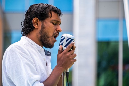 Asitha Tennekoon performing at a ‘Box Concert’. Photo credit: Dahlia Katz.