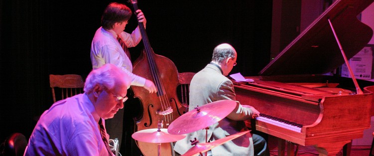 From Left: John Sumner, drums; Steve Wallace, bass; and Mark Eisenman, piano in 2007, playing a Carmen Unzipped cabaret with Jean Stilwell. Photo byPeter Martyn