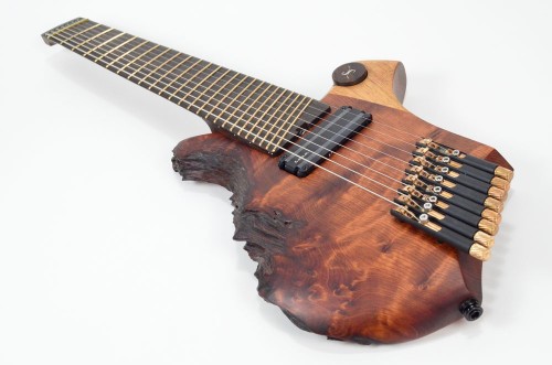 Michael Sankey’s “Hi-8”: a high-tuned eight-string guitar made primarily of reclaimed California Redwood, with a multiscale fretboard. It is one of the first guitars ever made to incorporate metal 3d printing. Photo by Michael Sankey