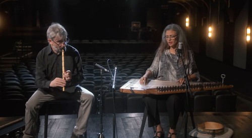 Cutline 3: Ernie (L) and Maryem (R) Tollar, performing in Sounds of Davenport.