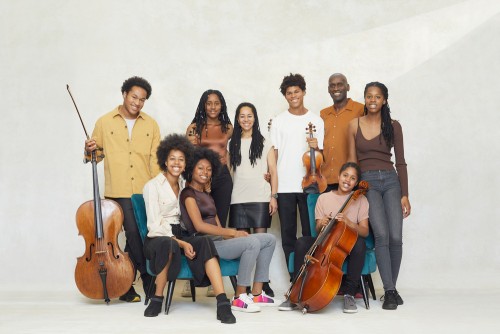 The Kanneh-Mason family. Back (l-r) Sheku, Aminata, Kadiatu, Braimah, Stuart and Jeneba. Front (l-r) Konya, Isata and Mariatu. Photo by JAKE TURVEY