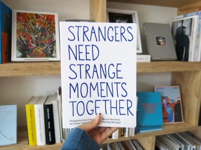 "Strangers Need Strange Moments Together"